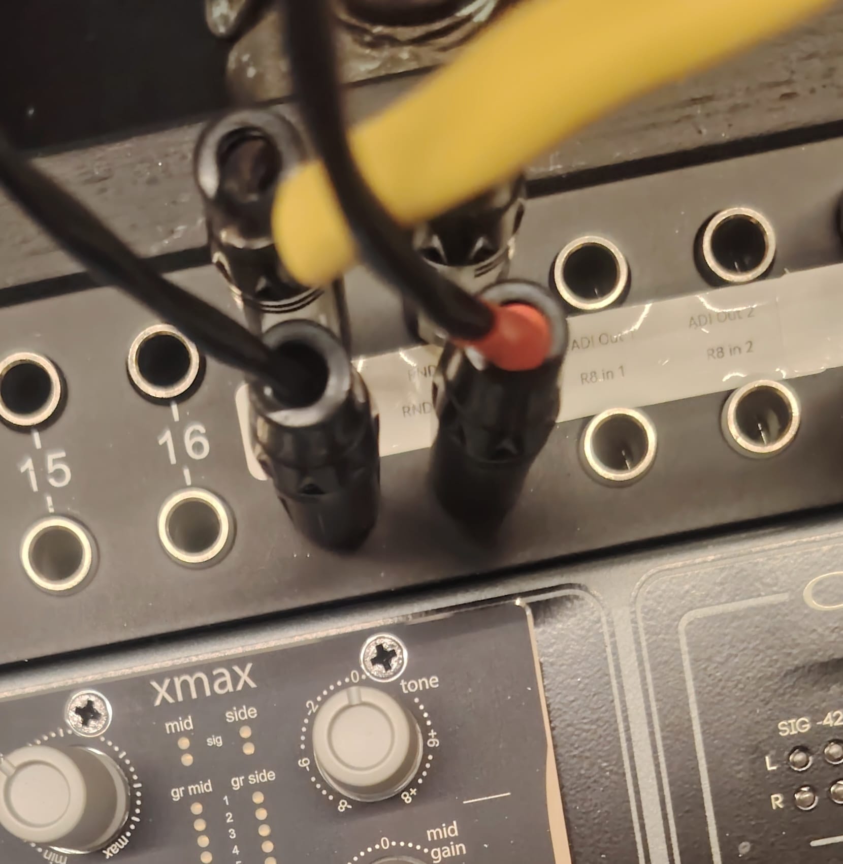 patch cables being used to route and bypass the HRK ST-552 tape emulator