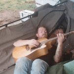 Steam Mastering Customer Grom Lloyd playing his guitar.