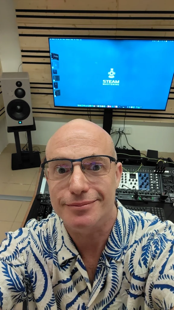 Mastering Engineer Allan from Steam Mastering in front of his console.